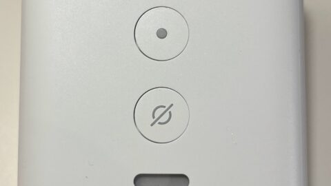 White Amazon Echo Flex smart speaker on a plain background